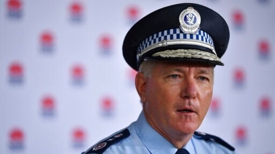 "Clearly putting people at risk by leaving home without a proper reason," Mick Fuller said, describing the two people as "idiots." (AP)