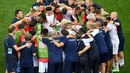 Swiss players embrace ahead of the penalty shoot-out during the Euro 2020 soccer championship round of 16 match between France and Switzerland at National Arena stadium, Bucharest, Romania, Tuesday, June 29, 2021. (Daniel Mihailescu/Pool Photo via AP) (AP) Swiss players embrace ahead of the penalty shoot-out during the Euro 2020 soccer championship round of 16 match between France and Switzerland at National Arena stadium, Bucharest, Romania, Tuesday, June 29, 2021. (Daniel Mihailescu/Pool Photo via AP) (AP)