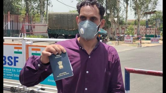 A man showing his passport after returning from Pakistan via the Attari-Wagah border on Monday. A man showing his passport after returning from Pakistan via the Attari-Wagah border on Monday.
