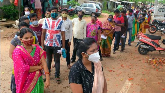 Odisha: People stand in a queue to take a dose of the Covid-19 vaccine at the Loyola school vaccination centre, in Bhubaneswar (ANI) Odisha: People stand in a queue to take a dose of the Covid-19 vaccine at the Loyola school vaccination centre, in Bhubaneswar (ANI)