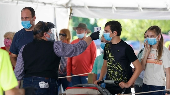 A clear divide has emerged across the country, with cases rising rapidly in communities that have low rates of vaccination. (AP | Representational image) A clear divide has emerged across the country, with cases rising rapidly in communities that have low rates of vaccination. (AP | Representational image)