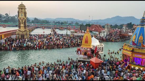 Devotees gather to offer prayers during the third 'Shahi Snan' of the Kumbh Mela 2021, at Har ki Pauri Ghat in Haridwar on April 14. (File photo) Devotees gather to offer prayers during the third 'Shahi Snan' of the Kumbh Mela 2021, at Har ki Pauri Ghat in Haridwar on April 14. (File photo)
