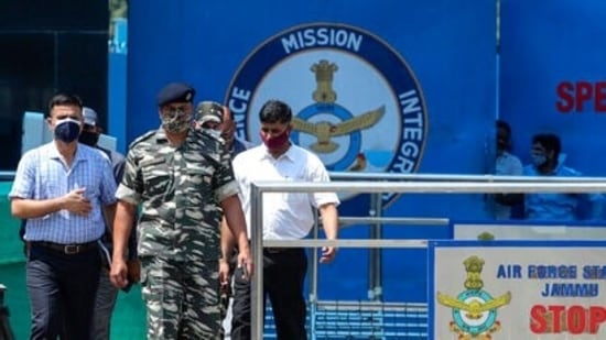 Indian paramilitary officials come out of the Jammu air force station after two suspected blasts were reported early morning in Jammu. (AP Photo) Indian paramilitary officials come out of the Jammu air force station after two suspected blasts were reported early morning in Jammu. (AP Photo)