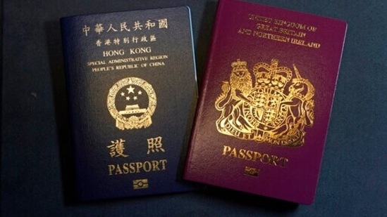 A British National Overseas passports (BNO) and a Hong Kong Special Administrative Region of the People's Republic of China passport are pictured in Hong Kong. (AP)