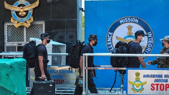 Security personnel at the Air Force Station in Jammu on Sunday. (PTI) Security personnel at the Air Force Station in Jammu on Sunday. (PTI)