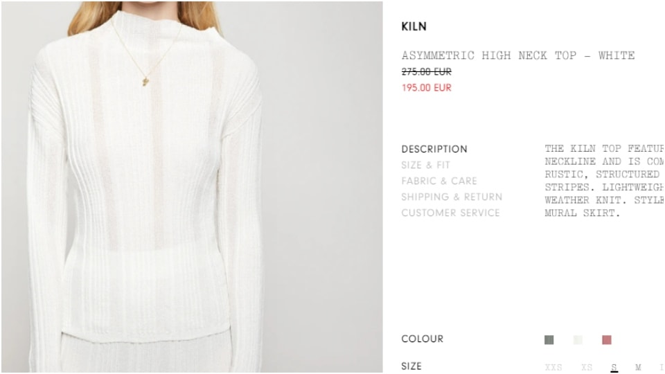 The asymmetric high neck top. (aeron.com) The asymmetric high neck top. (aeron.com)