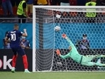 France's Kylian Mbappe has a penalty saved by Switzerland's Yann Sommer during the shoot-out