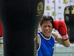 MC Mary Kom punches a bag during a training session MC Mary Kom punches a bag during a training session