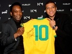File photo of Brazil legend Pele and French footballer Kylian Mbappe