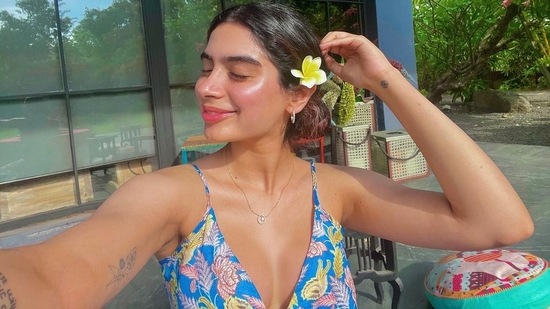 On her Instagram feed, Khushi posted a picture of herself in what appeared to be a blue, floral printed bikini top, she sported a flower in her hair and glowing sun kissed skin to complete her look.(Instagram)