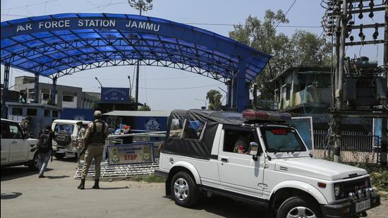 A National Investigation Agency team arrives at the Jammu air force station after two suspected blasts were reported early morning in Jammu on June 27, 2021. Indian officials said Sunday they suspected explosives-laden drones were used to attack the air base. (AP)