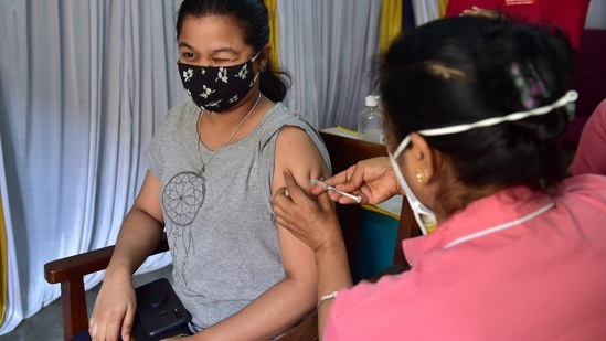 Bengaluru: A medic administers a dose of COVID-19 vaccine at a vaccination centre in Bengaluru on Monday (PTI) Bengaluru: A medic administers a dose of COVID-19 vaccine at a vaccination centre in Bengaluru on Monday (PTI)