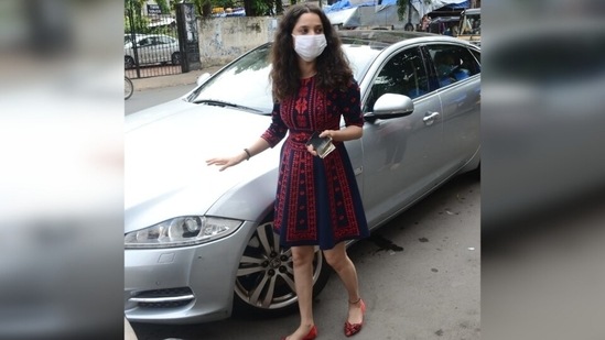 Ankita’s navy blue summer dress featured red floral embroidery all over. Its fit and flare silhouette added a dreamy vibe to her look.(Varinder Chawla)