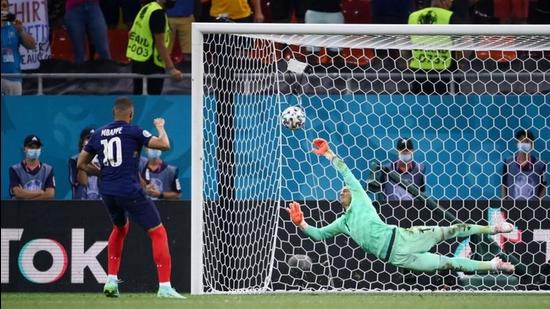 France’s Kylian Mbappe has a penalty saved by Switzerland’s Yann Sommer during the shoot-out during the Euro 2020 Round of 16 game in Bucharest. (REUTERS)