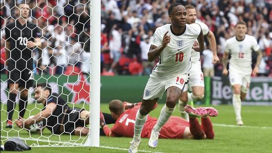 England’s Raheem Sterling celebrates after scoring his side's opening goal during the Euro 2020 Round of 16 match against Germany at the Wembley Stadium in London on Tuesday. (AP)