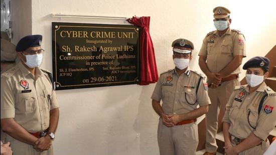 Ludhiana police commissioner Rakesh Agrawal with other cops after inaugurating the newly renovated cyber cell at the Sarabha Nagar police station on Tuesday. (HT PHOTO) Ludhiana police commissioner Rakesh Agrawal with other cops after inaugurating the newly renovated cyber cell at the Sarabha Nagar police station on Tuesday. (HT PHOTO)
