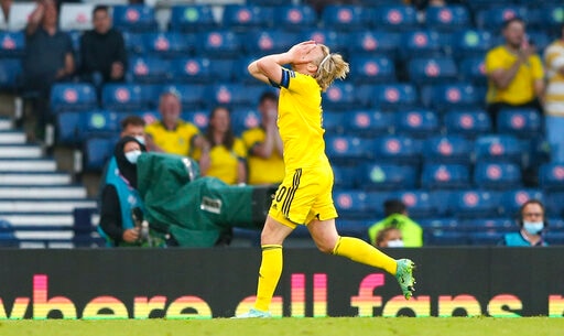 Exactly a minute later, Emil Forsberg's shot met the same fate as his curler came off the woodwork. (AP)