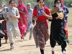 J&amp;K police recruitment: Large number of women turn up for PET
