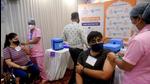 Beneficiaries receive a dose of Covid-19 vaccine during a camp at Vile Parle East, in Mumbai earlier this month. (File photo) Beneficiaries receive a dose of Covid-19 vaccine during a camp at Vile Parle East, in Mumbai earlier this month. (File photo)
