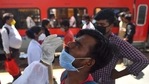 A health worker collects swab samples for Covid-19 test of passengers arriving from outstation trains, at Dadar station in Mumbai on Tuesday.(HT Photo) A health worker collects swab samples for Covid-19 test of passengers arriving from outstation trains, at Dadar station in Mumbai on Tuesday.(HT Photo)