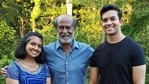 Rajinikanth posing for photos with fans. Rajinikanth posing for photos with fans.