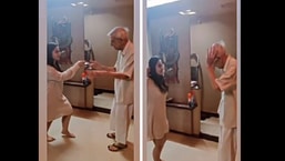 The image shows Divesha Bajaj dancing with her grandfather.