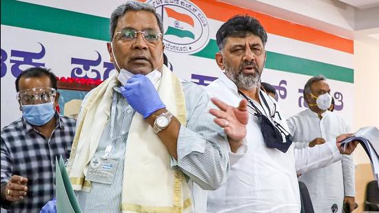 S Siddaramaiah and DK Shivakumar are said to be locked in a power tussle in Karnataka. (PTI) S Siddaramaiah and DK Shivakumar are said to be locked in a power tussle in Karnataka. (PTI)