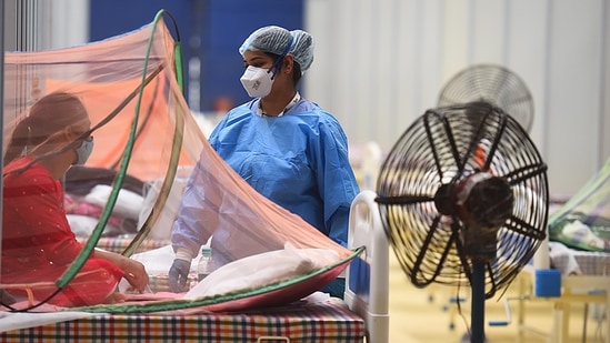 A fan placed near a Covid-19 patient at the Commonwealth Games (CWG) Covid care centre in New Delhi on June 29, when the maximum temperature in Delhi touched 43 degrees Celsius, which classifying it as the first heatwave day this season according to the India Meteorological Department (IMD). (Raj K Raj / HT Photo) A fan placed near a Covid-19 patient at the Commonwealth Games (CWG) Covid care centre in New Delhi on June 29, when the maximum temperature in Delhi touched 43 degrees Celsius, which classifying it as the first heatwave day this season according to the India Meteorological Department (IMD). (Raj K Raj / HT Photo)