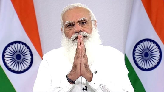 Prime Minister Narendra Modi addressesing the public through video conferencing in New Delhi on Sunday. (ANI Photo) Prime Minister Narendra Modi addressesing the public through video conferencing in New Delhi on Sunday. (ANI Photo)