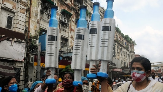 Left-wing activists take out a protest against the fake vaccination scam in Kolkata.(ANI)