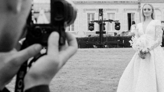 Sophie wore a stunning Louis Vuitton wedding gown while Joe picked a sharp black tuxedo for their special day.(Instagram)