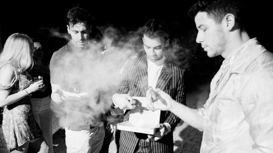 One of the pictures showed Joe alongside brothers Kevin Jonas and Nick Jonas onstage, likely giving the guests a special Jonas Brothers performance, and another showed them enjoying a cigar and drinks.(Instagram)