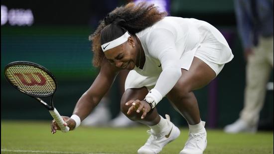Serena Williams falls to the ground during the women's singles first round match against Aliaksandra Sasnovich of Belarus on day two of Wimbledon in London on Tuesday. (AP) Serena Williams falls to the ground during the women's singles first round match against Aliaksandra Sasnovich of Belarus on day two of Wimbledon in London on Tuesday. (AP)