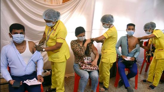 Beneficiaries receive their dose of Covid-19 vaccine during a special vaccination camp in Mumbai earlier this month. (File photo) Beneficiaries receive their dose of Covid-19 vaccine during a special vaccination camp in Mumbai earlier this month. (File photo)
