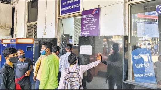 Passengers wait in a queue to get platform ticket at Pune railway station in Pune. (Shankar Narayan/HT PHOTO) Passengers wait in a queue to get platform ticket at Pune railway station in Pune. (Shankar Narayan/HT PHOTO)