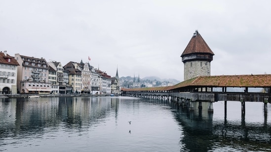 Lucerne: From city life to lakes and mountains, this place has it all. It is most famous for its 14th century Chapel Bridge and Water Tower and the monument Dying Lion which was carved out of rock to honor Swiss mercenaries.(Unsplash)