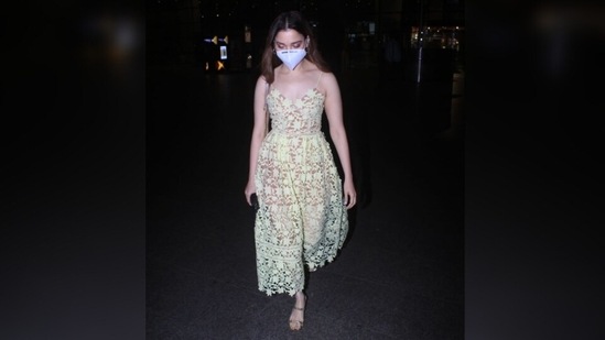 Tamannah wore a spaghetti-strapped dress outside the airport. She looked ready to embrace summers and sangrias in the pretty ensemble.(Varinder Chawla)