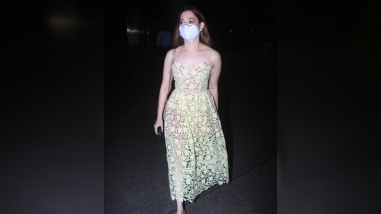 Tamannah rounded it all off with a pair of strappy pumps, hoop earrings and middle-parted open locks. For the glam, she chose dewy skin, subtle shimmery eye shadow and blush-tinted cheeks.(Varinder Chawla)
