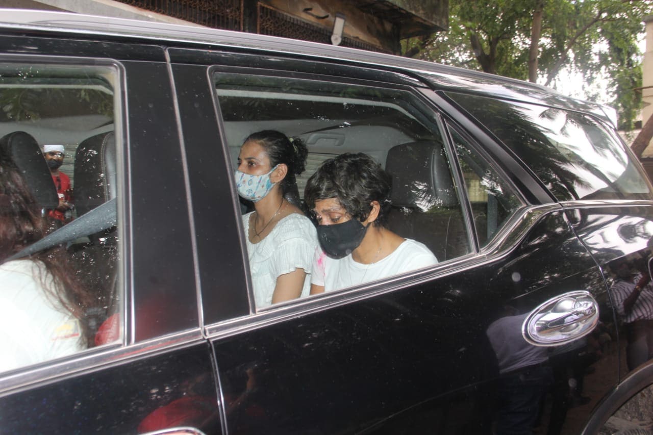 Mandira Bedi drives away in a car. Mandira Bedi drives away in a car.