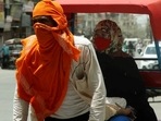 A rickshaw puller covers his face from the heatwave as temperature touches 44 degrees, in New Delhi on Wednesday. (ANI Photo) A rickshaw puller covers his face from the heatwave as temperature touches 44 degrees, in New Delhi on Wednesday. (ANI Photo)