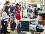 Air travellers get themselves registered for COVID-19 tests, at T-3 terminal of Indira Gandhi International Airport, in New Delhi. Air travellers get themselves registered for COVID-19 tests, at T-3 terminal of Indira Gandhi International Airport, in New Delhi.