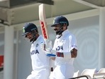 India's captain Virat Kohli, right, and Cheteshwar Pujara(AP) India's captain Virat Kohli, right, and Cheteshwar Pujara(AP)