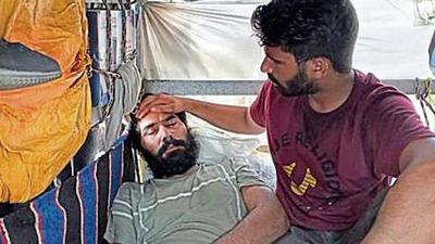 Thirty-six-year-old Surinderpal Singh, who has cleared the ETT (elementary teacher training)- TET (teacher eligibility test) but continues to remain unemployed, had started a fast unto death on June 22. He has been protesting atop a 260-foot mobile tower, where he has stayed put for the past 103 days. Thirty-six-year-old Surinderpal Singh, who has cleared the ETT (elementary teacher training)- TET (teacher eligibility test) but continues to remain unemployed, had started a fast unto death on June 22. He has been protesting atop a 260-foot mobile tower, where he has stayed put for the past 103 days.