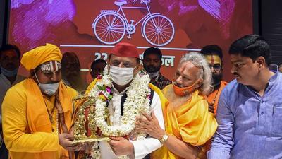 Samajwadi Party chief Akhilesh Yadav receiving a gift from saints on his birthday on Thursday. (PTI PHOTO) Samajwadi Party chief Akhilesh Yadav receiving a gift from saints on his birthday on Thursday. (PTI PHOTO)
