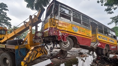Mangled remains of a minibus enroute from Metiabruz to Howrah after it crashed into a wall of the Fort William at Red road, in Kolkata. (PTI Photo) Mangled remains of a minibus enroute from Metiabruz to Howrah after it crashed into a wall of the Fort William at Red road, in Kolkata. (PTI Photo)