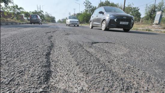 Paucity of funds has left several roads in Chandigarh in a state of disrepair. (HT File Photo)