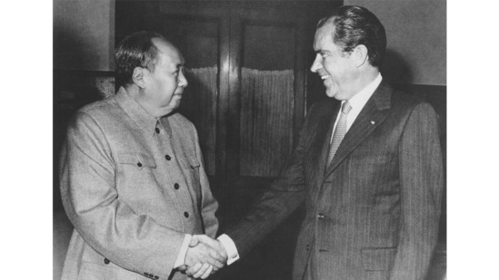 Chinese communist party leader Mao Zedong and US President Richard Nixon shake hands as they meet in Beijing, China on February 21, 1972. Tossed into the middle of a potential thawing in US relations with China, Judy Bochenski and her American ping pong teammates helped deliver one of the great diplomatic coups of their time. Their hastily arranged trip for exhibitions in three Chinese cities helped part the Red Curtain and open the way to a new world order that included China. It worked so well that President Richard Nixon would get on Air Force One the next year to make a state visit to China that enthralled the world.(AP Photo)