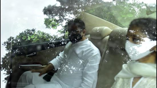 Poll strategist and political consultant Prashant Kishor and Supriya Sule leave NCP chief Sharad Pawar's residence after meeting him, in Mumbai early June. (Anshuman Poyrekar/HT PHOTO)