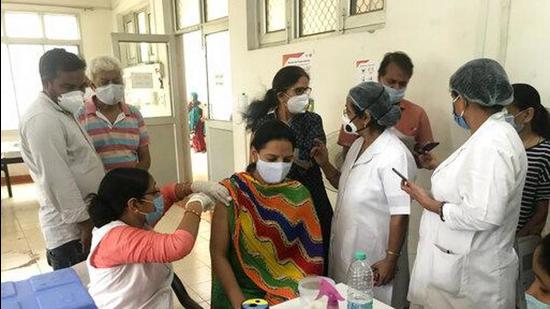 A woman beneficiary being administered Covid vaccine in a hospital in Uttar Pradesh. (PTI FILE PHOTO)