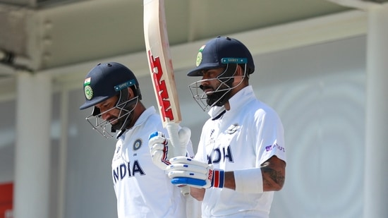 India's captain Virat Kohli, right, and Cheteshwar Pujara(AP)